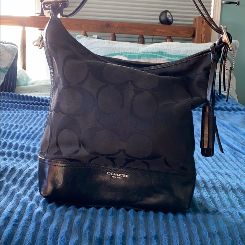 Black Coach canvas/leather bag.